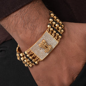 ASHOK STAMBH Design High-quality Gold Plated 5 Line Rudraksha Bracelet For Men ASHOK STAMBH Design High-quality Gold Plated 5 Line Rudraksha Bracelet For Men