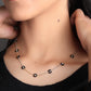 black flora gold and silver tanmaniya necklace