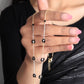 black flora gold and silver tanmaniya necklace