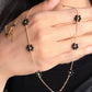 black flora gold tanmaniya necklace