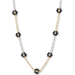 black flora gold and silver tanmaniya necklace