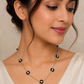 black flora gold and silver tanmaniya necklace